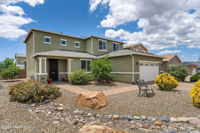 13109 E Gonzalez St, Dewey-Humboldt, AZ 86327 - traditional-style home with stucco siding, a garage, and driveway