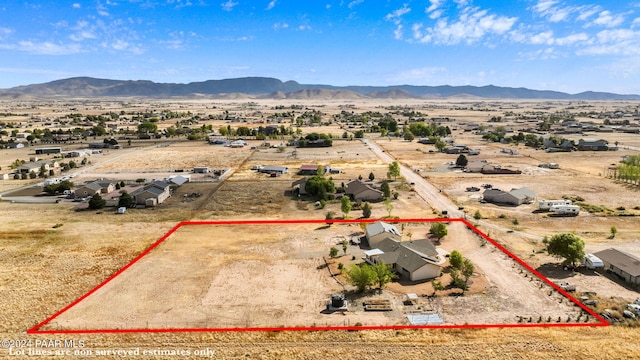 bird's eye view with view of desert, a rural view, and a mountain view