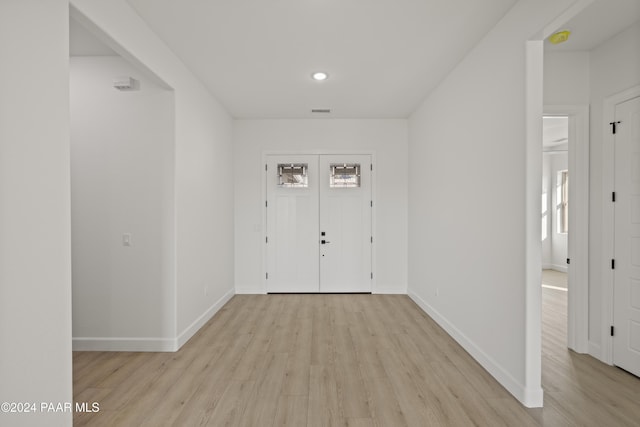 entrance foyer with light hardwood / wood-style flooring