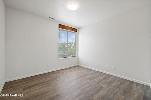 3225 Pamela St, Prescott, AZ 86305 - empty room featuring dark wood finished floors and baseboards