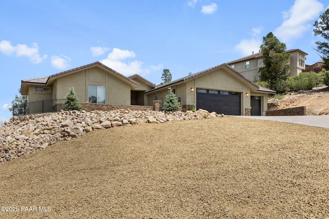 3225 Pamela St, Prescott, AZ 86305 - ranch-style house with stucco siding, concrete driveway, and an attached garage