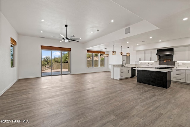 3225 Pamela St, Prescott, AZ 86305 - unfurnished living room featuring recessed lighting, a ceiling fan, wood finished floors, and baseboards