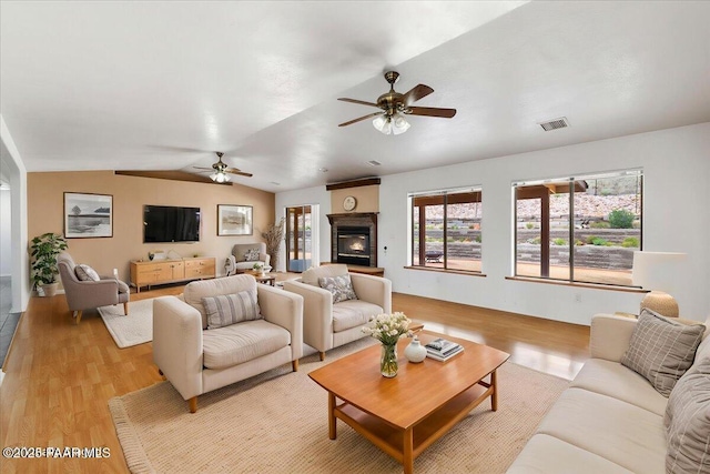 20775 N Hackamore Ln, Paulden, AZ 86334 - living area featuring a ceiling fan, light wood finished floors, and lofted ceiling