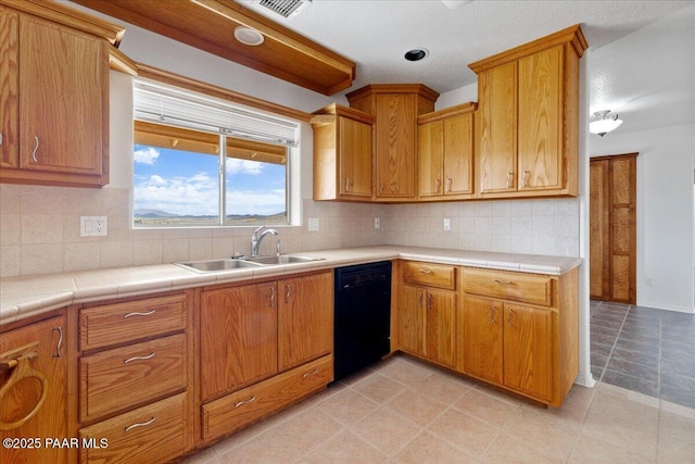 20775 N Hackamore Ln, Paulden, AZ 86334 - kitchen featuring dishwasher, a sink, tasteful backsplash, brown cabinetry, and tile countertops