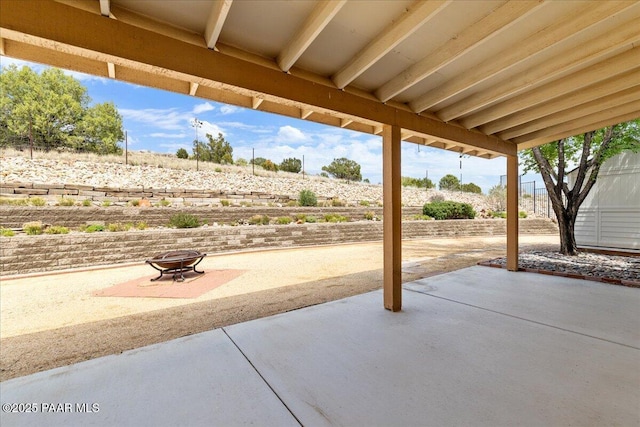 20775 N Hackamore Ln, Paulden, AZ 86334 - view of patio featuring an outdoor fire pit