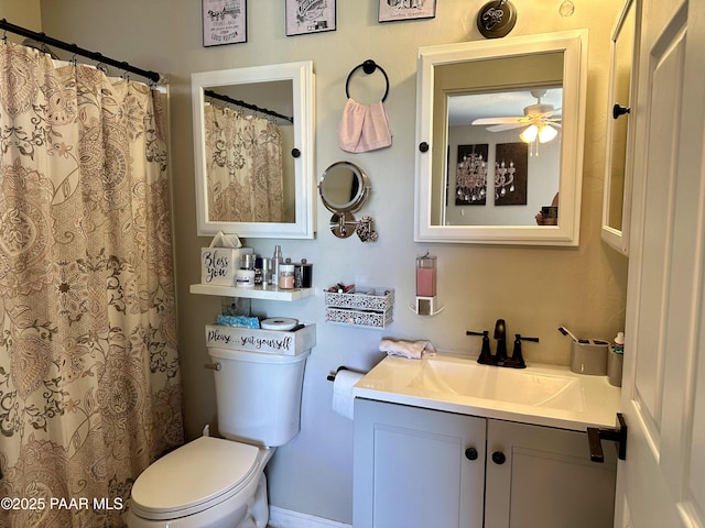 bathroom with vanity, ceiling fan, and toilet