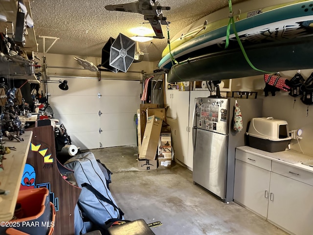 garage featuring stainless steel fridge