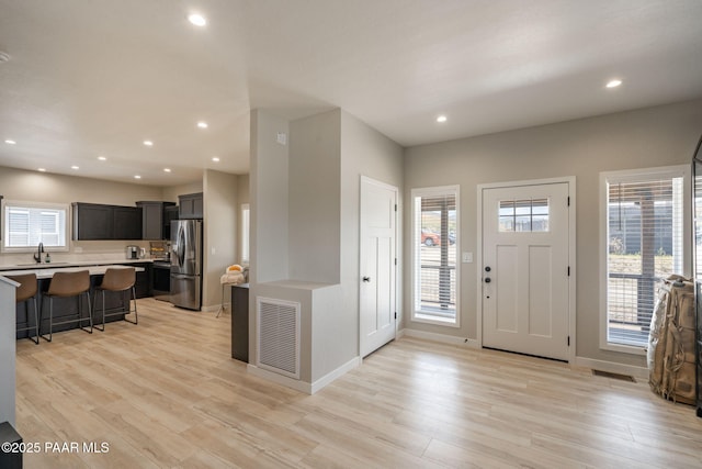2905 S Omega Dr, Dewey-Humboldt, AZ 86329 - entrance foyer with recessed lighting, light wood finished floors, and baseboards
