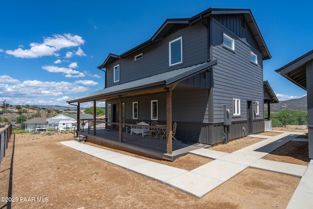 2905 S Omega Dr, Dewey-Humboldt, AZ 86329 - view of front of property featuring board and batten siding and a porch