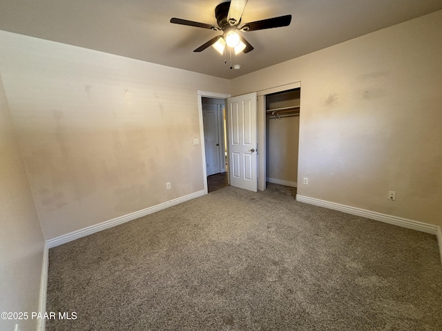 unfurnished bedroom featuring a closet, carpet flooring, a ceiling fan, and baseboards