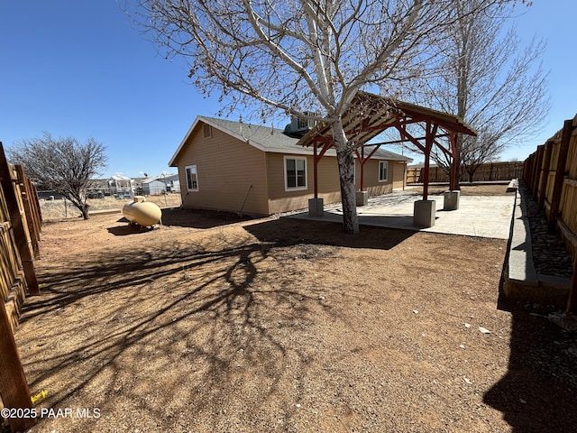 view of yard with a patio area and a fenced backyard