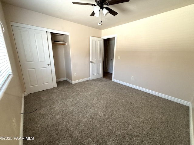 unfurnished bedroom with a closet, ceiling fan, baseboards, and carpet floors