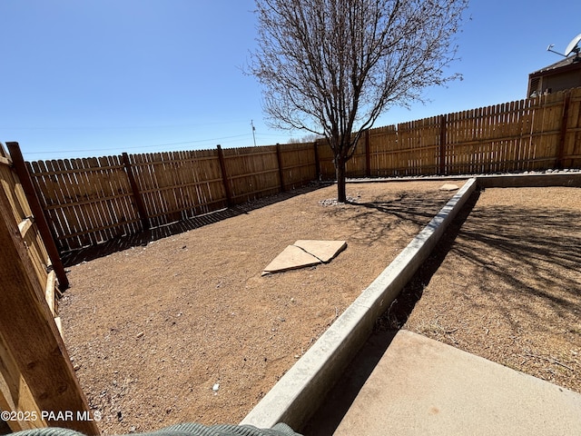 view of yard featuring a fenced backyard