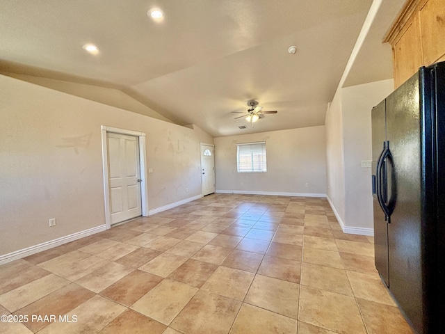 spare room featuring a ceiling fan, recessed lighting, light tile patterned flooring, baseboards, and vaulted ceiling