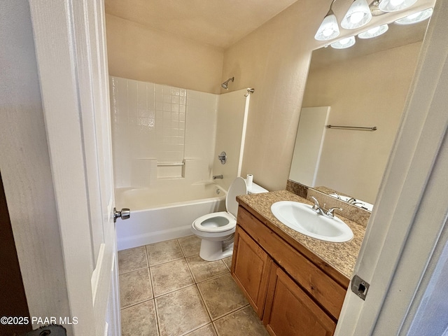 full bath with tile patterned floors, toilet, vanity, and washtub / shower combination