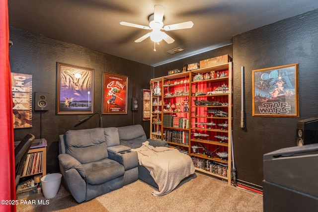 248 Lakewood Cv, Prescott, AZ 86301 - living area with ceiling fan, carpet floors, and a textured wall