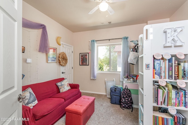 248 Lakewood Cv, Prescott, AZ 86301 - living area featuring carpet floors, a ceiling fan, and baseboards
