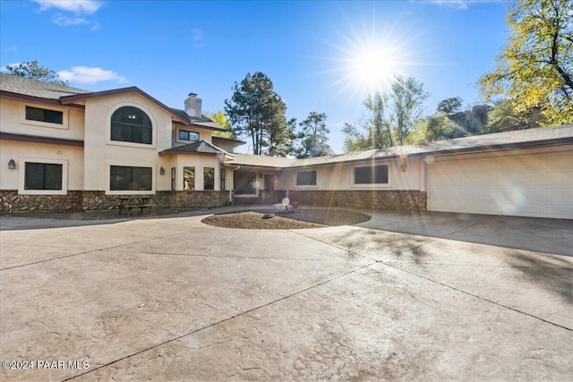 view of front of home with a garage