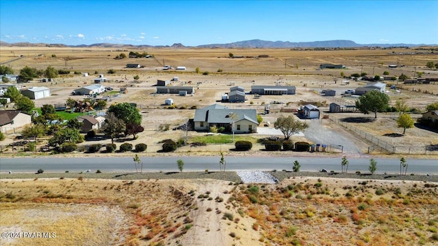 aerial view with a mountain view and a rural view