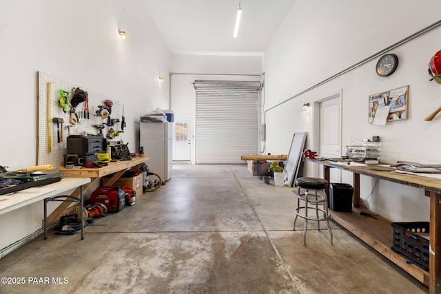 garage featuring a workshop area