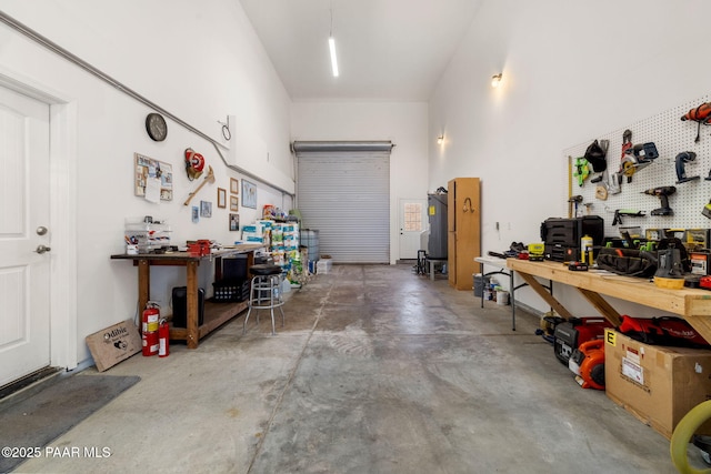 garage with a workshop area