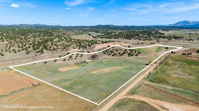 aerial view featuring a mountain view and a rural view