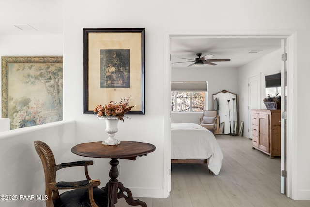 bedroom with light hardwood / wood-style floors