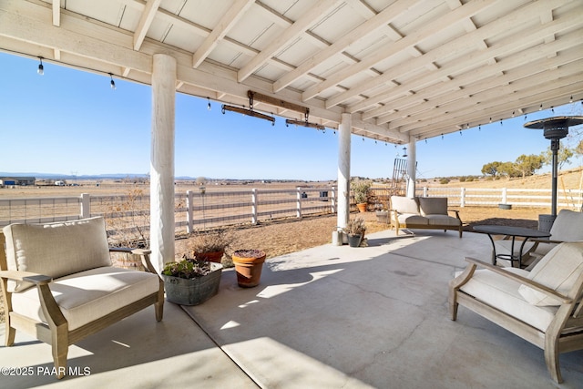 view of patio with a rural view