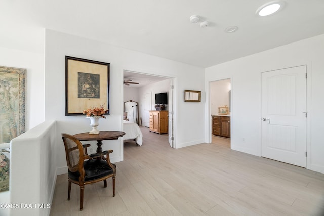 sitting room with light wood-type flooring