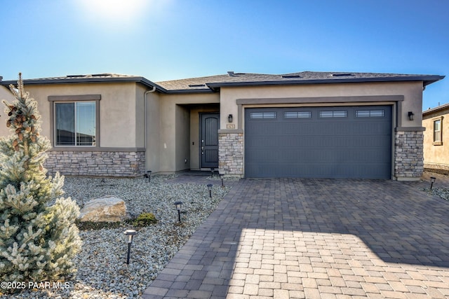 prairie-style home featuring a garage