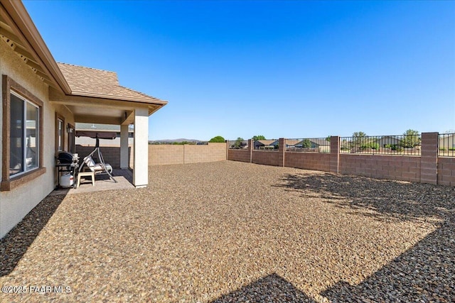 12912 E Santiago St, Dewey-Humboldt, AZ 86327 - fenced backyard featuring a patio area