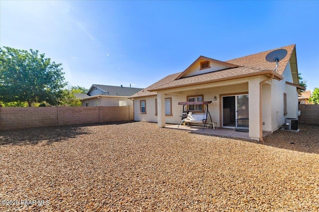 12912 E Santiago St, Dewey-Humboldt, AZ 86327 - back of property featuring a fenced backyard, a patio, stucco siding, and roof with shingles