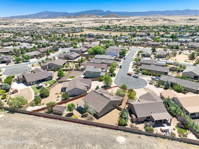 7506 E Roaring Canyon Rd, Prescott Valley, AZ 86315 - aerial perspective of suburban area with property parcel outlined and a mountain backdrop