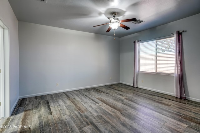 7506 E Roaring Canyon Rd, Prescott Valley, AZ 86315 - spare room with a ceiling fan and dark wood-type flooring