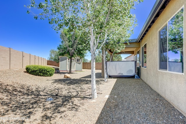 7506 E Roaring Canyon Rd, Prescott Valley, AZ 86315 - fenced backyard featuring a storage unit