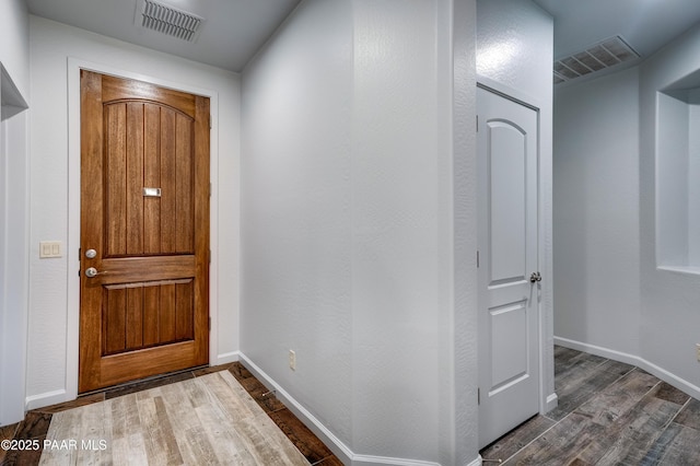 7506 E Roaring Canyon Rd, Prescott Valley, AZ 86315 - entryway featuring dark wood-style flooring and baseboards