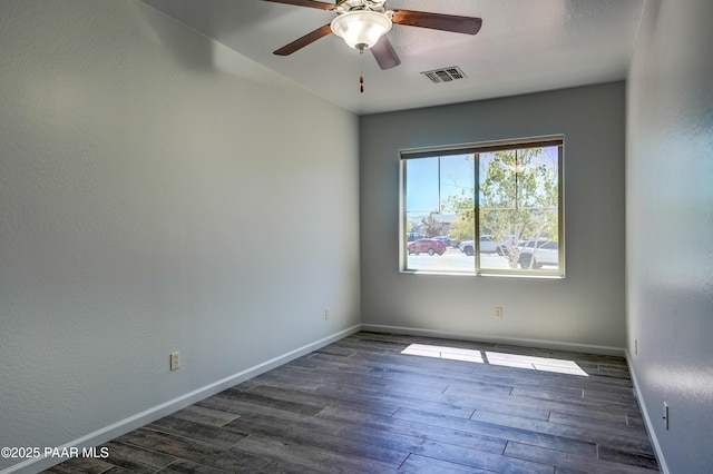 7506 E Roaring Canyon Rd, Prescott Valley, AZ 86315 - spare room with dark wood-style flooring and ceiling fan