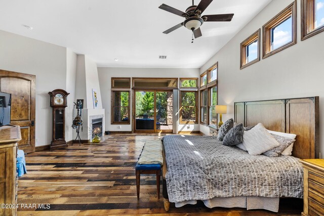 bedroom featuring access to outside, ceiling fan, and hardwood / wood-style floors