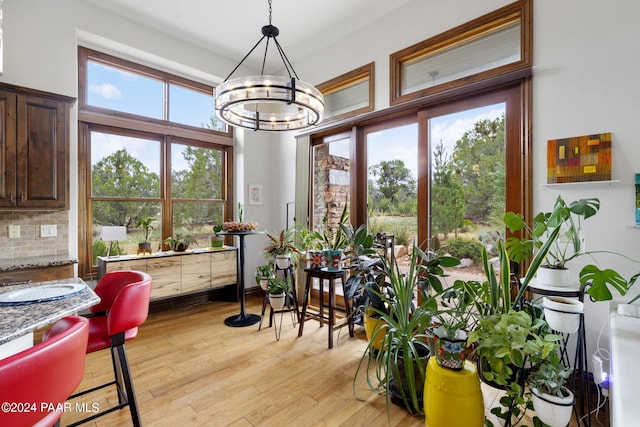 interior space featuring a chandelier and plenty of natural light