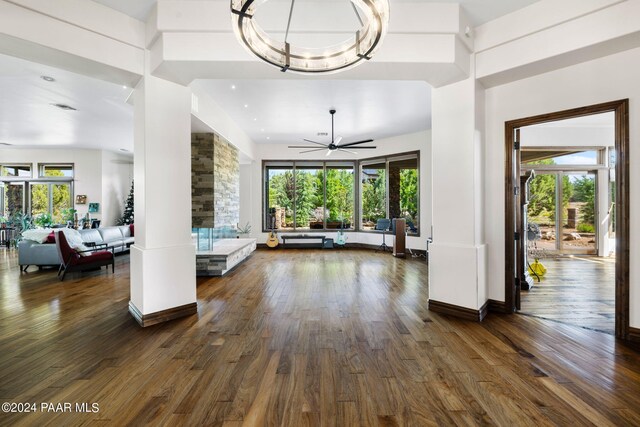 interior space featuring ceiling fan and dark hardwood / wood-style floors