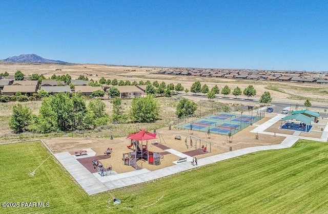 birds eye view of property featuring a mountain view