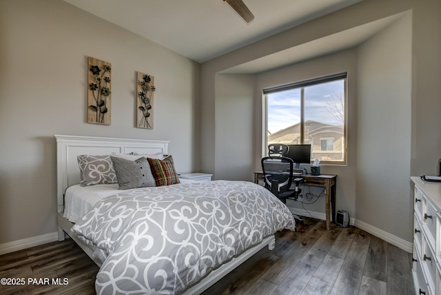 bedroom featuring dark hardwood / wood-style flooring