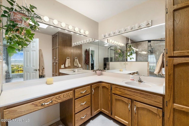 bathroom featuring vanity and an enclosed shower