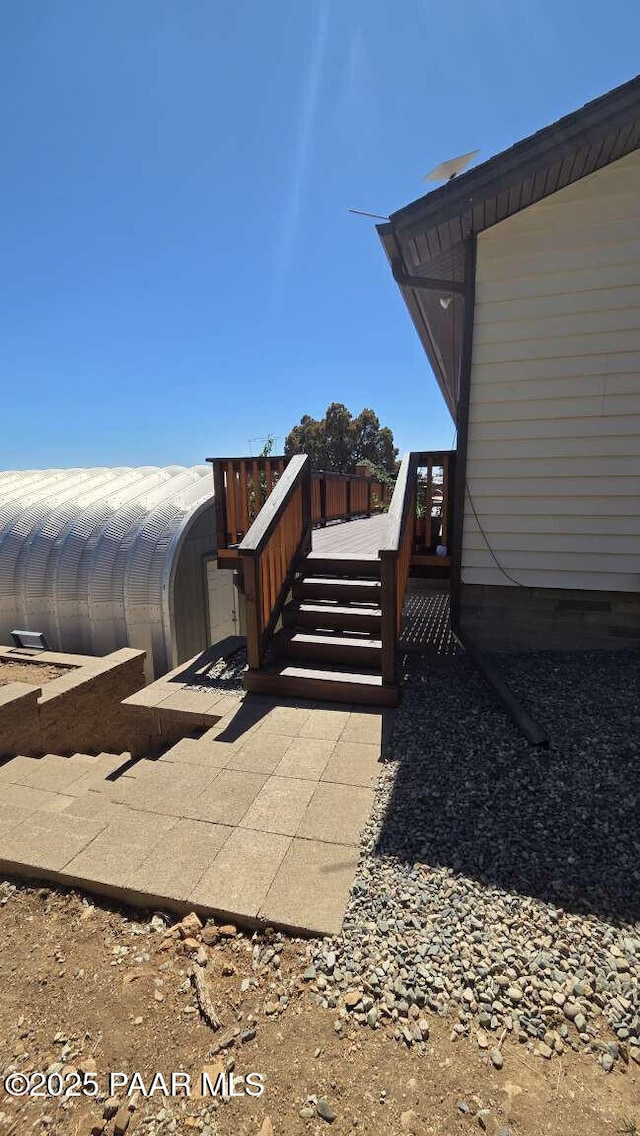 wooden deck with grilling area