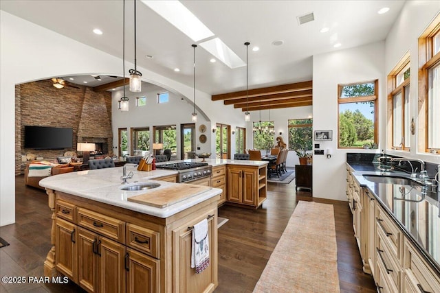 15345 N Badlands Cir, Prescott, AZ 86305 - kitchen with healthy amount of natural light, a spacious island, a towering ceiling, open floor plan, and recessed lighting