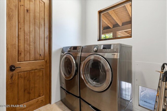 15345 N Badlands Cir, Prescott, AZ 86305 - laundry area with washing machine and dryer and light tile patterned floors