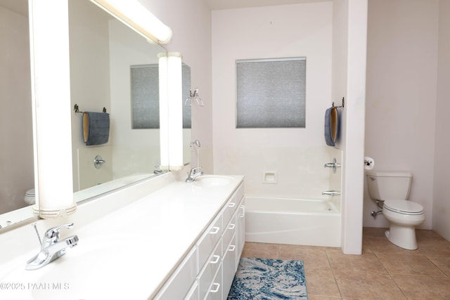 1980 S Koch Ranch Rd, Cornville, AZ 86325 - bathroom with toilet, tile patterned floors, a garden tub, and a sink