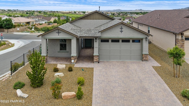 single story home featuring a garage