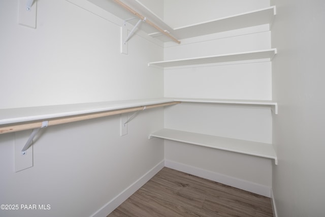 6881 E Bourbon Way, Prescott Valley, AZ 86315 - spacious closet featuring wood finished floors
