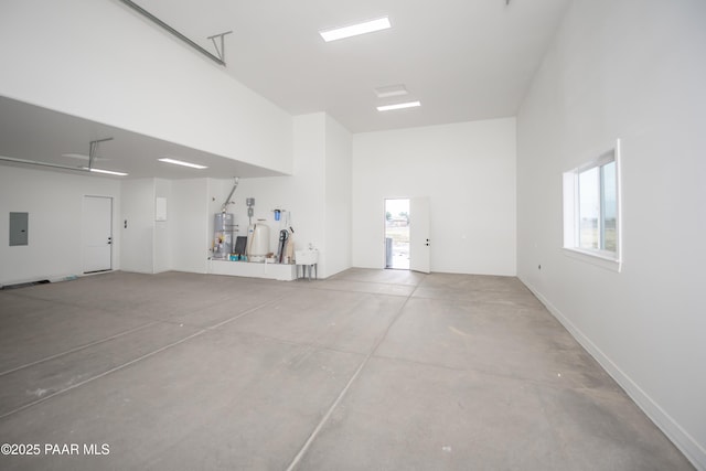 6881 E Bourbon Way, Prescott Valley, AZ 86315 - garage featuring water heater and electric panel